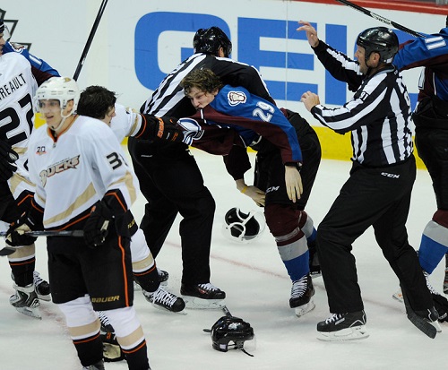 The Colorado Avalanche's 2013 number one overall pick, Nathan MacKinnon, dropped the gloves with Anaheim's Ben Lovejoy during their game Wednesday night. MacKinnon would put up two assists in his NHL debut, a 6-1 win. (Karl Gehring/The Denver Post)