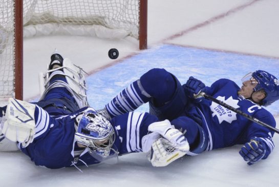  Leafs goalie James Reimer and defenceman Dion Phaneuf collide in the crease in the third period of Game 4. (Photo by Rick Madonik / Toronto Star)