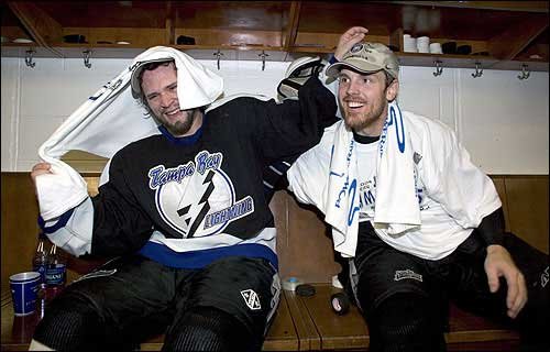 A much younger Martin St. Louis and Brad Richards – celebrating their Eastern Conference championship in 2004 after eliminating Philadelphia in seven games. (Photo via LJWorld.com)