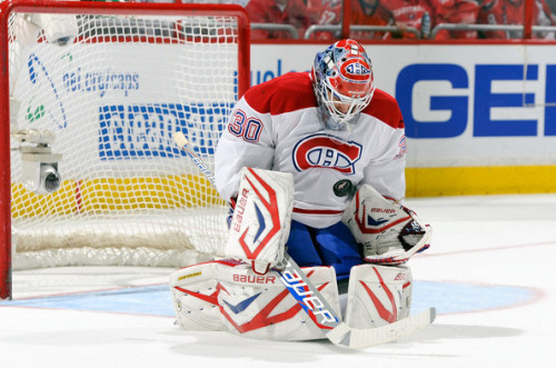 The Jets added goaltender Peter Budaj (pictured) and forward Peter Holland from the Montreal Canadiens on Sunday, in exchange for forward Eric Tangradi. Budaj was played on waivers shortly after, but will likely start some games for the Jets this season if Pavelec struggles. (Greg Flume/Getty Images)