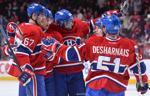 Max Pacioretty #67, Andrei Markov #79, P.K. Subban #76, Brendan Gallagher #11 and David Desharnais #51 of the Montreal Canadiens celebrate their power play goal against the Carolina Hurricanes during the NHL game on April 1, 2013 at the Bell Centre in Montreal, Quebec, Canada. (Photo by Francois Lacasse/NHLI via Getty Images)