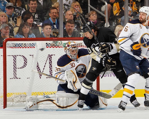 Ryan Miller #30 of the Buffalo Sabres makes a save in front of Brenden Morrow #10 of the Pittsburgh Penguins and Mike Weber #6 on April 23, 2013 at Consol Energy Center in Pittsburgh, Pennsylvania. (Photo by Gregory Shamus/NHLI via Getty Images)