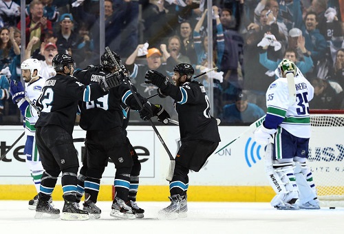 Patrick Marleau #12, Logan Couture #39, Joe Pavelski #8 and Joe Thornton #19 of the San Jose Sharks celebrate after Joe Pavelski #8 scored a first period power play goal against goaltender Cory Schneider #35 of the Vancouver Canucks (Photo by Christian Petersen/Getty Images)