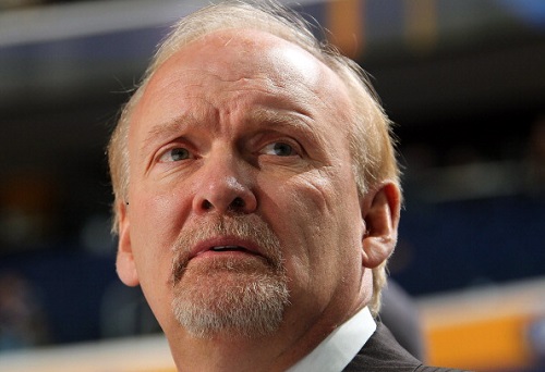 Head coach Lindy Ruff of the Buffalo Sabres watches the action against the Colorado Avalanche at First Niagara Center on March 14, 2012 in Buffalo, New York.  (Photo by Bill Wippert/NHLI via Getty Images)