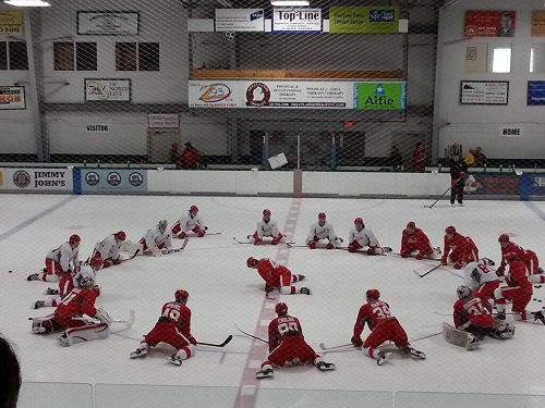 Darren Helm leading the stretching circle