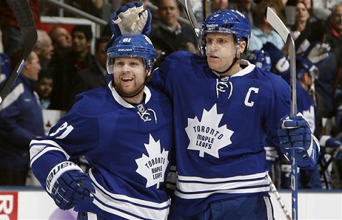 Phil Kessel #81 and Dion Phaneuf #3 of the Toronto Maple Leafs celebrate