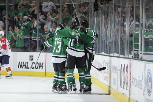 Ray Whitney #13, Brenden Dillon #4 and the Dallas Stars celebrate a goal against the Florida Panthers in the home opener at the American Airlines Center.  (Photo by Glenn James/NHLI via Getty Images)
