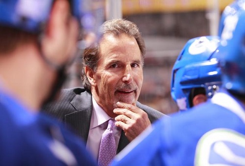 Tortorella scratching his peach fuzz during a game this season. Credit: Jeff Vinnick/Getty Images