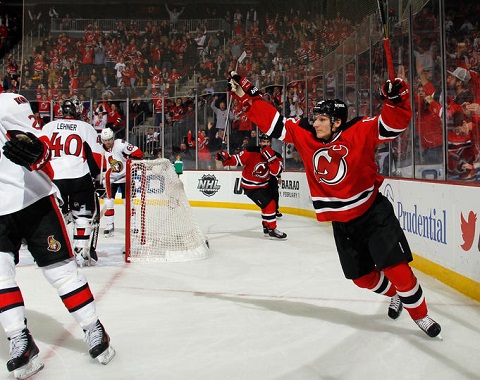 Damien Brunner #12 of the New Jersey Devils celebrates his goal at 19:32 against the Ottawa Senators at the Prudential Center on December 18, 2013 in Newark, New Jersey. (Photo by Bruce Bennett/Getty Images)