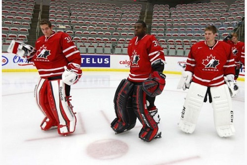 Jake Paterson (right) was the third string goalie for Team Canada last year