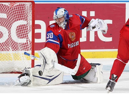 Russian goaltender Andrei Vasilevski makes a kick save en route to a 7-1 drubbing of Switzerland Credit: Andre Ringuette/HHOF-IIHF Images   