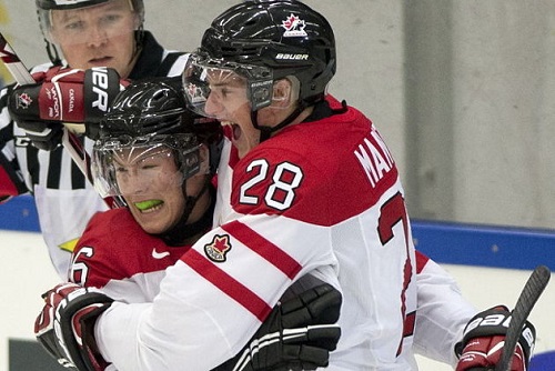 Curtis Lazar (left) and Anthony Mantha celebrate Mantha's first goal against Germany Thursday at the World Junior Hockey Championship in Malmo, Sweden. (Photo by Frank Gunn, The Canadian Press)