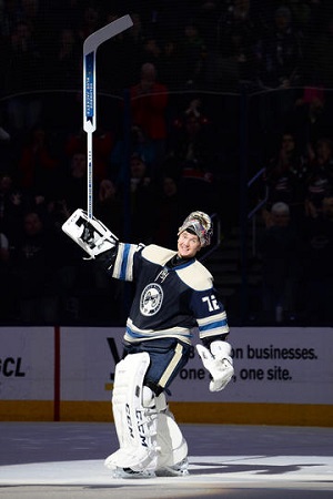 COLUMBUS, OH - JANUARY 10: Goaltender Sergei Bobrovsky #72 of the Columbus Blue Jackets waves to the fans after getting first-star of the game for his shutout against the Carolina Hurricanes on January 10, 2014 at Nationwide Arena in Columbus, Ohio. (Photo by Jamie Sabau/NHLI via Getty Images)