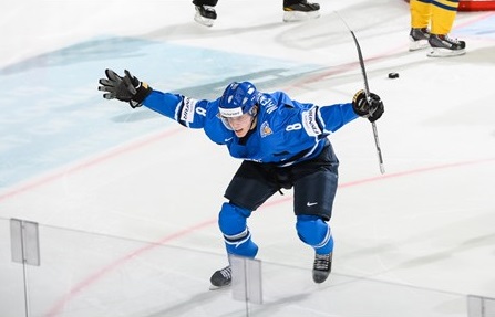 Finland's #8 Saku Maenalanen put the puck into the net and Finland took the lead again in the second period during gold medal action against Sweden. (Photo by Francois Laplante/HHOF-IIHF Images)