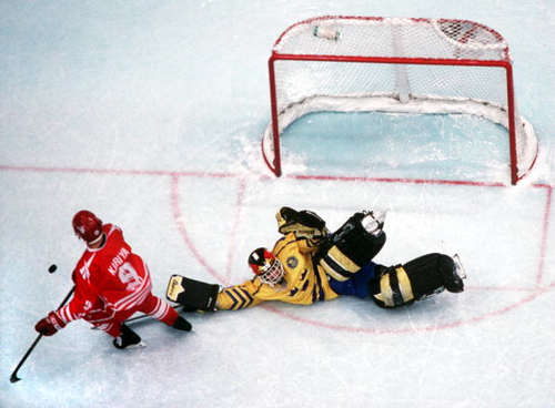 Tommy Salo makes a history-making save on Canada's Paul Kariya to win the shootout and the Gold in 1994 in Lillehammer, Norway. (Photo by Chris Cole - Allsport/Getty Images)
