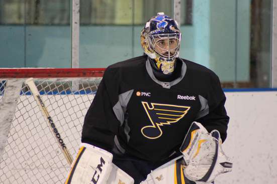 Blues goaltender Ryan Miller suits up for practice in his newly designed mask, fashioned after his favorite goalie Curtis Joseph. (Photo by St. Louis Blues)
