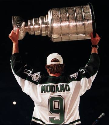 Mike Modano famously shed tears after the Dallas Stars won their first and only Stanley Cup in the third overtime against the Buffalo Sabres. (Photo by Andy Scott/Staff Photographer)