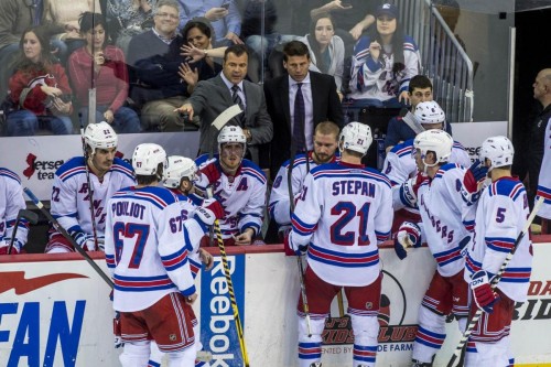 Alain Vigneault has provided a much more lax work environment in his first season behind the Rangers bench. (Photo by Howard Simmons – New York Daily News)