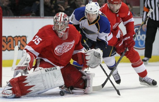 Blues forward Jaden Schwartz attempts to locate and put the puck past Red Wings goaltender Jimmy Howard. The Blues have struggled to score of late, including being shutout by the Red Wings April 13. (Photo by Dax Melmer/The Windsor Star)