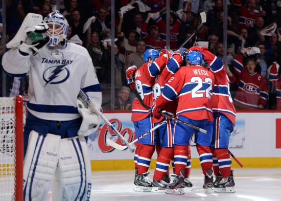 MONTREAL, QC - APRIL 22: Daniel Briere #48 of the Montreal Canadiens celebrates with teammates Dale Weise #22, Michael Bournival #49 and Francis Bouillon #55 after scoring a goal on Anders Lindback #39 of the Tampa Bay Lightning in Game Four of the First Round of the 2014 Stanley Cup Playoffs on April 22, 2014 at the Bell Centre in Montreal, Quebec, Canada. (Photo by Francois Lacasse/NHLI via Getty Images)