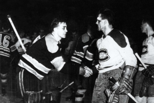 "Sugar" Jim Henry of the Boston Bruins congratulates Maurice Richard of the Montreal Canadiens, following Game Seven of the 1952 Stanely Cup Semi-Final. The Canadiens won the game, and the series, with Richard scoring the winning goal. (Photo courtesy of Hockey Hall of Fame)
