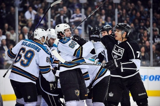April 5, 2012; Los Angeles, CA, USA; Los Angeles Kings players engage San Jose Sharks players during the first period at Staples Center. (Photo by Gary A. Vasquez-USA TODAY Sports)