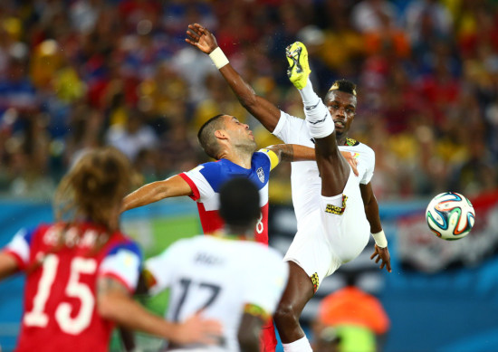 Jun 16, 2014; Natal, BRAZIL; USA forward Clint Dempsey (left) is kicked in the face by Ghana defender John Boye in the first half during the 2014 World Cup at Estadio das Dunas. (Photo by Mark J. Rebilas-USA TODAY)