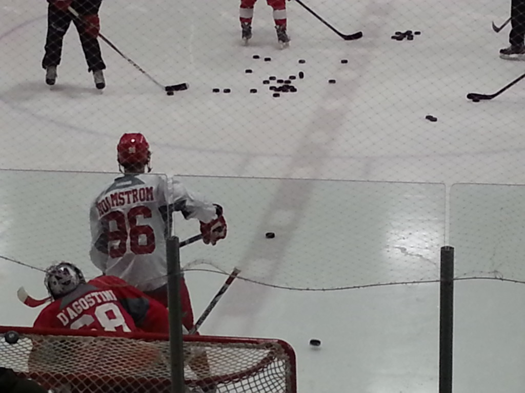 Axel Holmstrom works on his deflections during the skills portion of Sunday's on-ice training. (Photo taken by author)