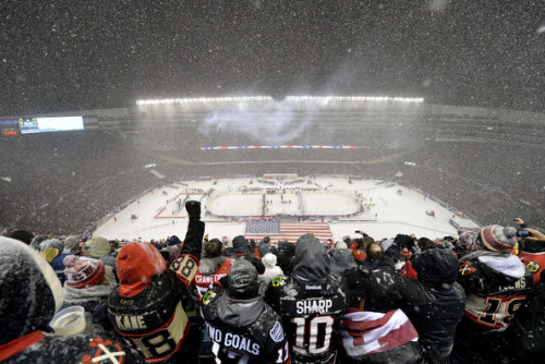 Fans cheer as the National Anthem is sung before the 2014 Coors Light NHL Stadium Series game between the Chicago Blackhawks and the Pittsburgh Penguins at Soldier Field on March 1, 2014 in Chicago, Illinois. The Blackhawks defeated the Penguins 5-1.  (Photo by Brian Kersey/Getty Images North America) 