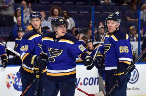 Steen, Lindbohm and Stastny to a moment to measure up the opposing team. (Scott Rovak)