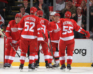 Red Wings defenseman Niklas Kronwall scores his team's fourth goal in a 4-2 win over the New Jersey Devils Friday night. (Dave Reginek/NHLI via Getty Images)