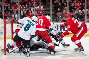 Detroit Red Wings forward Tomas Jurco scores his team's first goal in a 6-4 loss to the San Jose Sharks on March 26, 2015 at Joe Louis Arena.(Photo by Dave Reginek/NHLI via Getty Images)