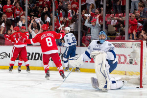 Gustav Nyquist is congratulated by his linemates after scoring his first goal of the 2015 playoffs.  (Photo by Dave Reginek/NHLI via Getty Images)