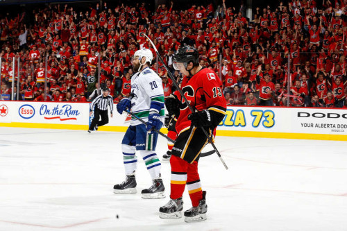 Johnny Gaudreau celebrates a goal in a Game Four victory against the Canucks. (Gerry Thomas – NHLi via Getty Images)