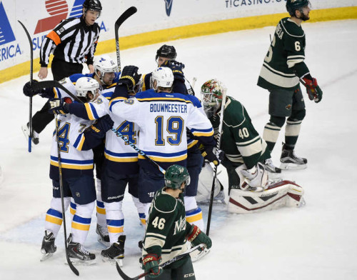 The Blues were celebrating goals on Devan Dubnyk often in their 6-1 Game Four victory on Wednesday night. (Hannah Foslien – Getty Images)