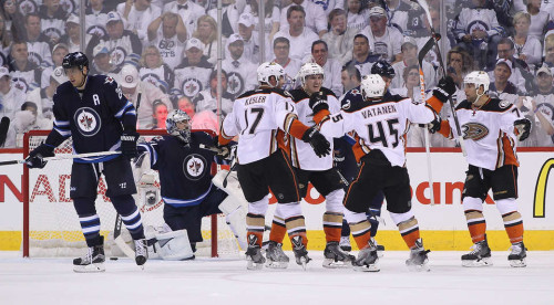 The Ducks celebrating goals has become a common occurrence in the third period against Winnipeg in this series. (Marianne Helm – Getty Images)
