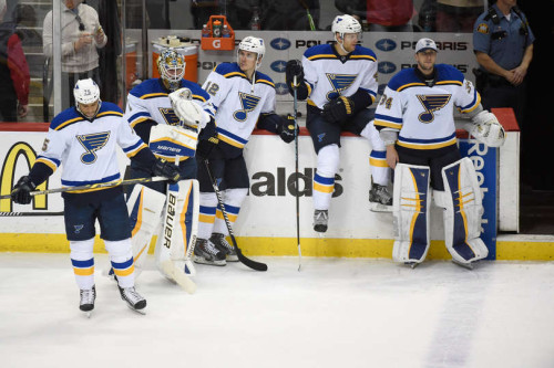 The St. Louis Blues look on as their season ends at the expense of the Wild moving on to the second round of the playoffs. (Hannah Foslien – Getty Images)