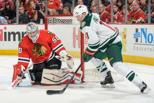 Corey Crawford needs to be better than he was in the first round. Zach Parise had seven points in the first round. (Bill Smith – NHLi via Getty Images)