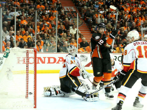 Ducks pucks going by Flames goalies has been a common occurrence in this series so far. (Stephen Dunn – Getty Images)