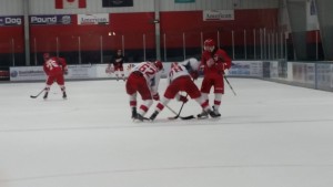 Forwards Zach Nastasiuk (#62) and Dominic Turgeon (#78) practice their faceoff abilities. (Photo by Author)