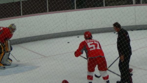 Grand Rapids Griffins forward Mitch Callahan practices with goalies Chase Perry and Tomas Kral. (Photo by Author)