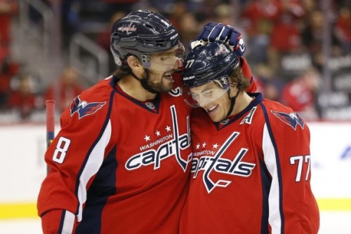 Ovechkin congratulates Oshie with a pat on the helmet (Photo by Geoff Burke)