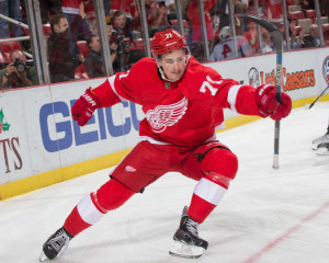 Rookie forward Dylan Larkin celebrates his first period goal on November 19, 2015. (Photo by Dave Reginek/NHLI via Getty Images)