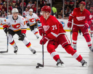 Dylan Larkin scored the Red Wings' first goal against the Calgary Flames on December 20, 2015. (Photo by Dave Reginek/NHLI via Getty Images)