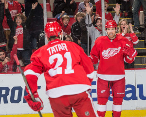 Brad Richards (right) celebrates his first goal as a Detroit Red Wing in a game against the Nashville Predators on December 5, 2015.  (Photo by Dave Reginek/NHLI via Getty Images)