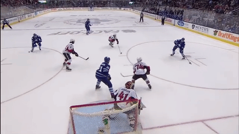 Nazem Kadri shoots the puck, he reaches out, winds up, and then pulls the trigger