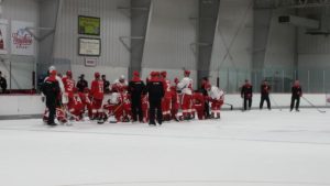 Players are given instructions by Red Wings coach Jeff Blashill and Griffins coach Todd Nelson during a Game 1 practice session of Detroit's Traverse City Training Camp. September 23, 2016. (Photo by Author)
