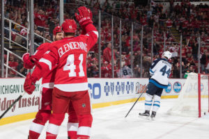 Luke Glendening is congratulated after scoring his first goal of the 2016-17 season. November 4, 2016.(Photo by Dave Reginek/NHLI via Getty Images)