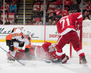 Flyers forward Brayden Schenn puts the puck past Jimmy Howard for the 1-0 overtime winner on Sunday, December 11, 2016. Joe Louis Arena. (Photo by Dave Reginek/NHLI via Getty Images)